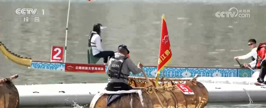 6月19日端午各地举行龙舟竞渡活动 汨罗江赛场考验过弯技术  第2张
