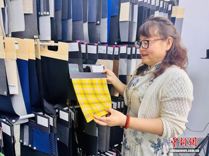 浙江柯桥：55个民族8.8万同胞扎根纺织业  第2张